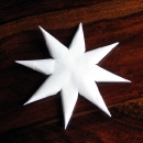 Roll and glue until all eight points are finished